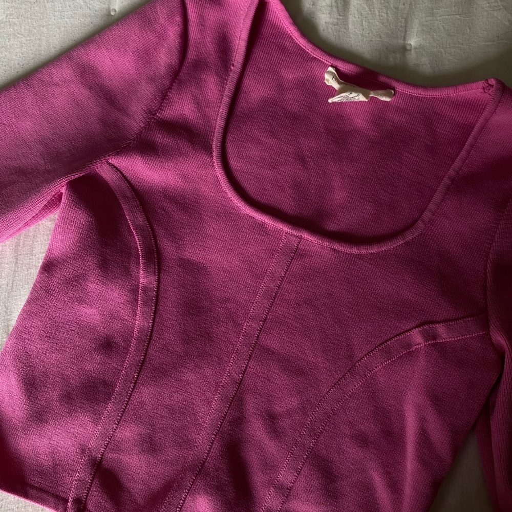 pink long sleeve corset-like top